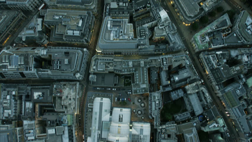 Aerial overhead rooftop view of business and financial buildings in inner city London England