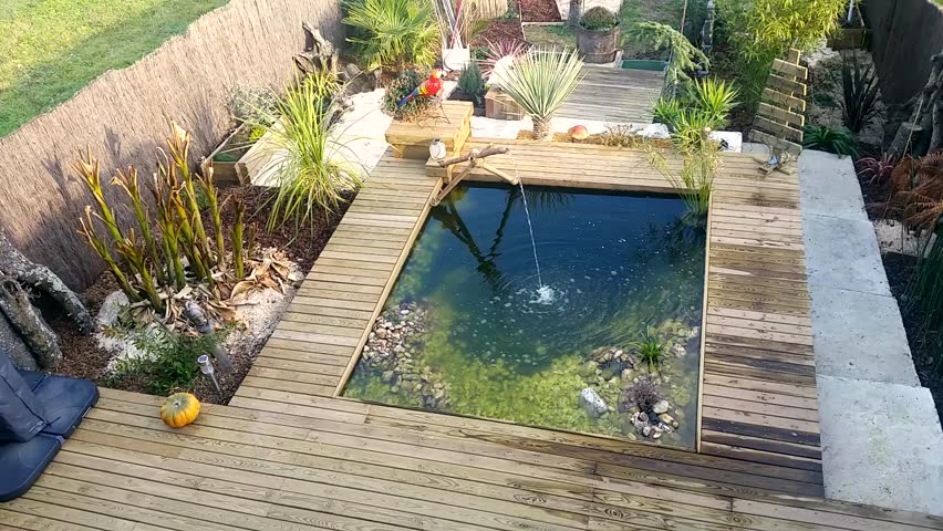 rectangular garden pond with water fountain and plants hd stock footage clip - Rectangle Pool Aerial View rectangular garden pond with water fountain and plants hd stock footage clip - Rectangle Pool Aerial View