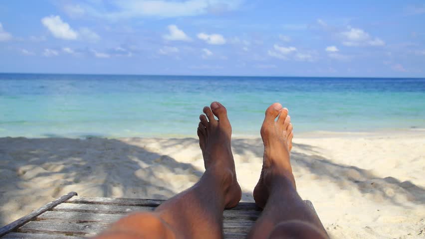 Man Feet Relaxing On Beach Stock Footage Video 100