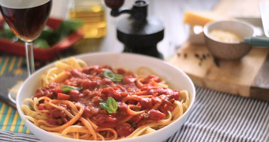 Pasta Penne With Bolognese Sauce, Parmesan Cheese And Basil On A Fork ...