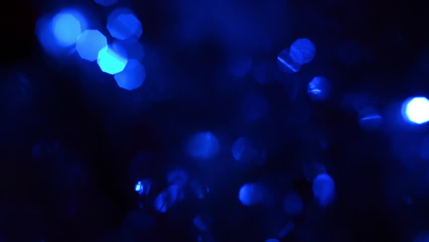 Multicolored Circular Flashing Lights On A Dark Background Beautiful