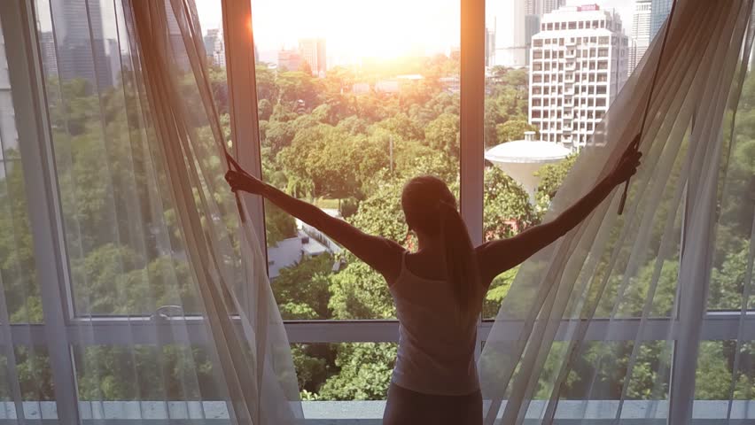 Woman Walking To Balcony And Unveil Curtains, Steadicam Shot Stock ... Woman Walking To Balcony And Unveil Curtains, Steadicam Shot Stock ...