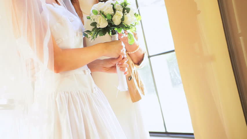 Grandmother Posing With Young Blonde Granddaughter Wedding