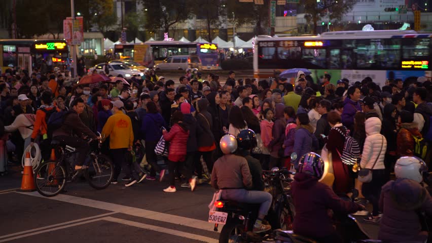 Taipei, Taiwan-05 February, 2017: 4K Sidewalk View Of Walking Crowd People Crossing Street In 