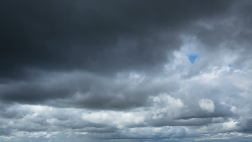 STORMY EVENING TIME LAPSE DARK RAIN CLOUDS ROLLING WITH DARK BLUE SKIES ...