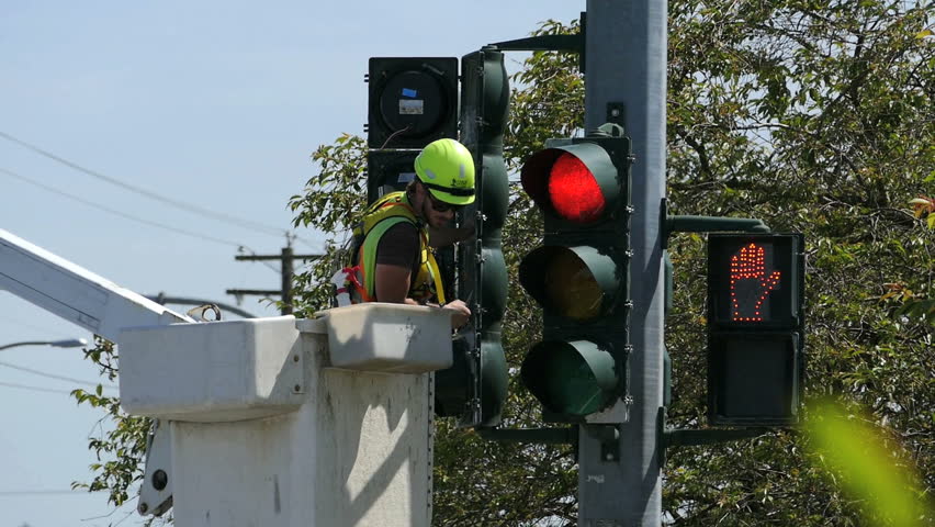 Vancouver Bc June 2018 A Traffic Light Technician Carefully Vancouver Bc Canada June 2018 A Traffic Light Technician Carefully Repairs