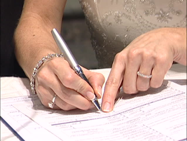 Signing The Register Stock Footage Video 100 Royalty Free 27913 Signing The Register