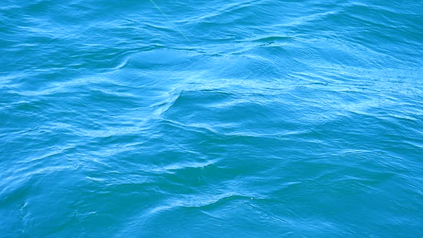 Detailed Blue Sea Water Closeup With Smooth Movement During Good ...