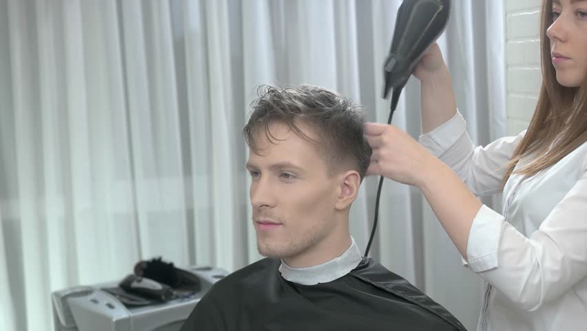 Female Barber Drying Hair Male Hairdressing Salon Customer