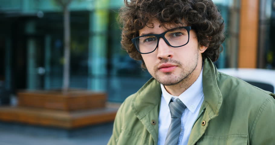 4k00 07portrait Of Young Attractive Man In Glasses With Curly Hair Use