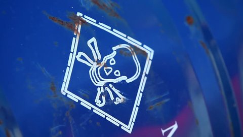 White Warning Sign with Skull and Methanol danger sign and methanol special marks at blue can