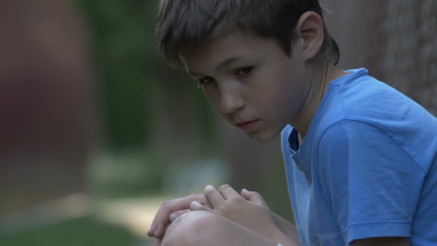 Sad Upset Abused Teenager Boy Sitting Alone, Lonely Serious Offended ...