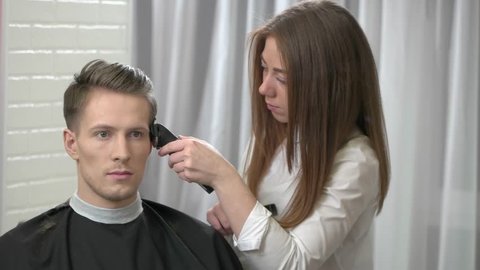 Girl Hairdresser Makes Hairstyle Guy Stock Footage Video 100