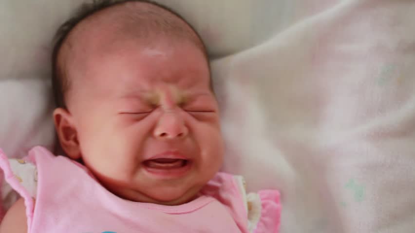 Newborn Baby Girl Crying In His Bed Stock Footage Video 19017040 ...