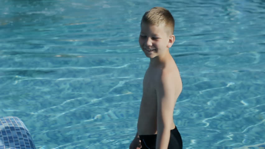 little boy swimming