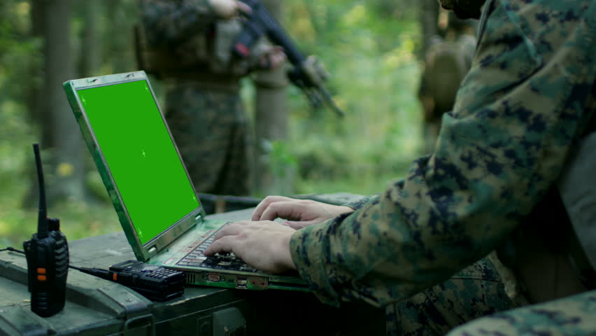 Close-up Soldier Uses Military Grade Stock Footage Video (100% Royalty