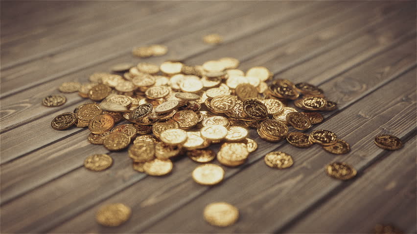 Flying Golden Coins.Pile Of Coins Falling On The Wooden Table.High ...