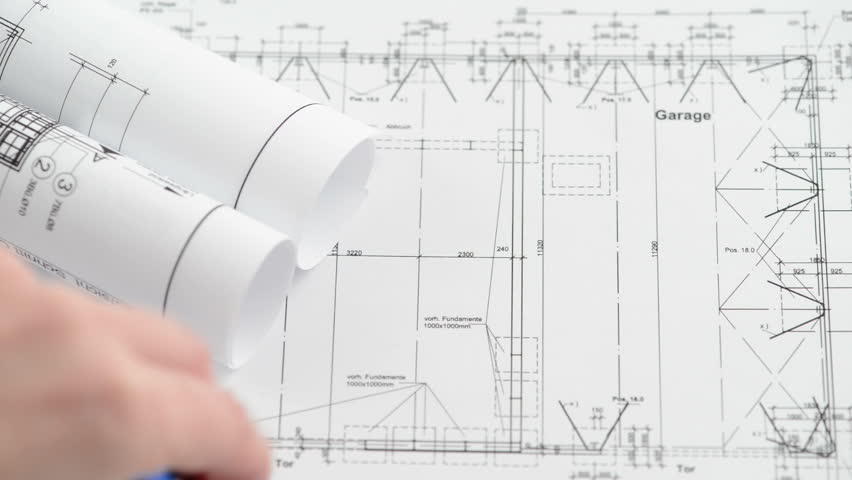 Architectural Drawing Blueprint place on an architectural drawing blueprint a triangle and a pen Architectural Drawing Blueprint place on an architectural drawing blueprint a triangle and a pen