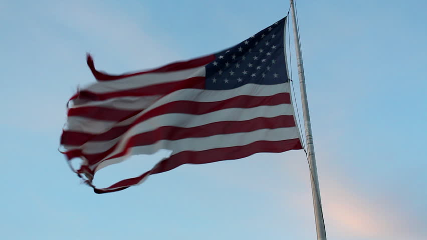 A Torn And Tattered American Flag Waves In The Wind Stock Footage Video ...