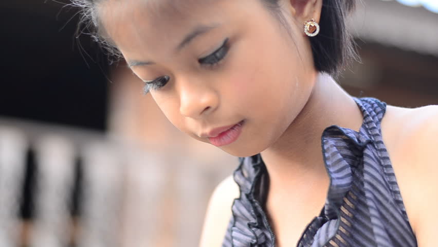 Stock Video Clip Of Face Of Asian Young Girl  Shutterstock-6385