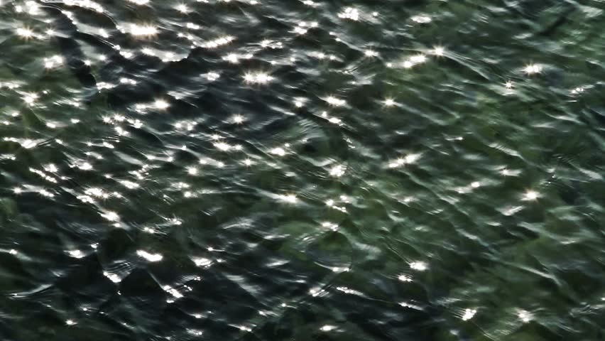 The Surface Of The Water Sparkles In The Sun At The Sparkling Waves ...