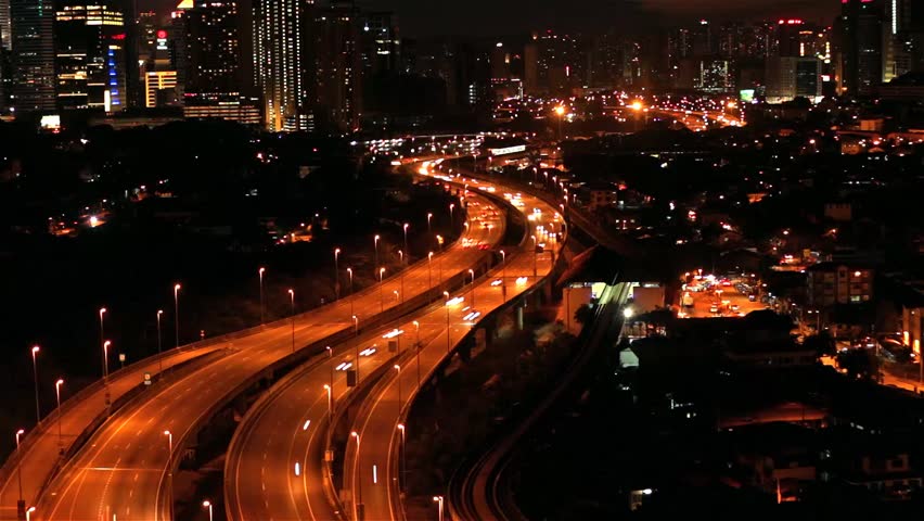 Aerial View Of Illuminated Highway Traffic At Night. Car Lights Traffic ...