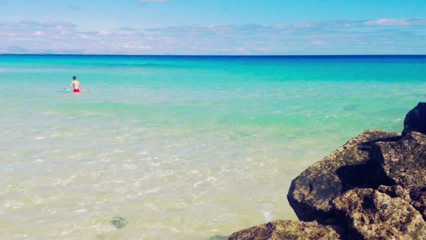 Stock video of a little boy surfer swimming on 5187173 Shutterstock