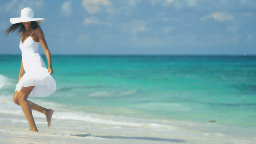 Sunbathing Woman On Mauritius Beach Lying On A Reclining Chair With ...