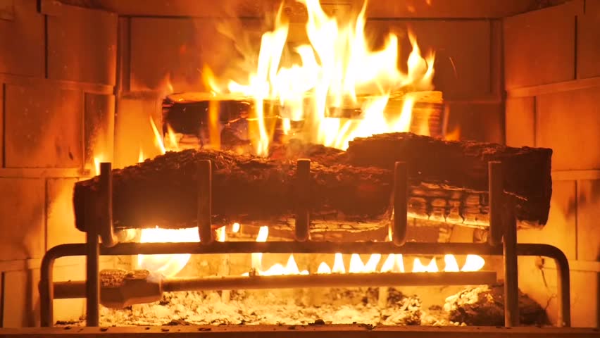 Hd00 30medium Shot Of A Yule Log Burning In A Fireplace