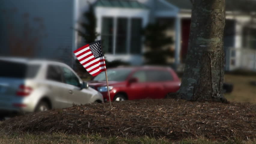 American Flag in Front Yard Stock Footage Video (100% Royalty-free