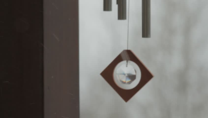 Wind Chimes Stock Footage Video Shutterstock Wind Chime Cabin Snow A S In The As Falls Around