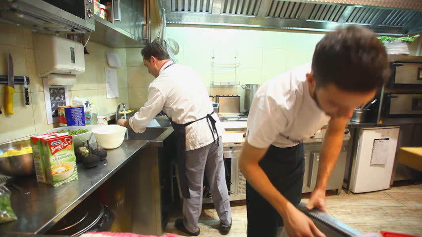 Restaurant Kitchen Video busy chefs in kitchen in restaurant stock footage video 6091616 Restaurant Kitchen Video busy chefs in kitchen in restaurant stock footage video 6091616