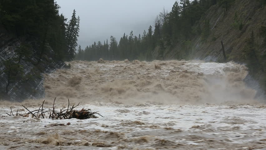 Flood Water Cascading Down Swollen Mountain River Nr Banff, Alberta ...