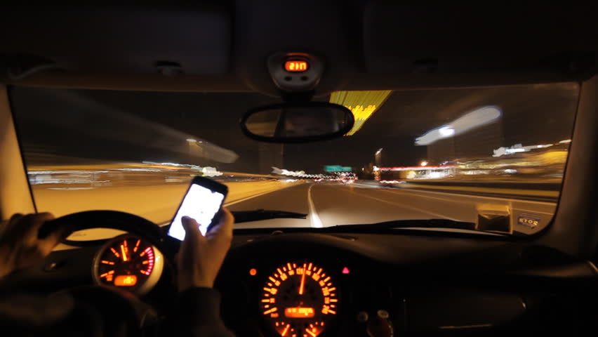 Texting And Playing With Smart Phone While Royalty Free Video Texting And Playing With Smart Phone While Driving Overtaking Dangerously At Night Inside Car Point Of View