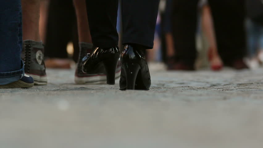 Ground Level Shot Of Teenage High School Students Walking Through The ...