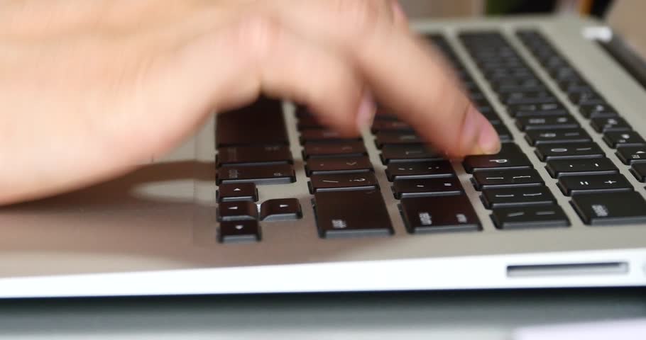 4k computer notebook laptop keyboard input closeup,write article,writing report. gh2_08279_4k