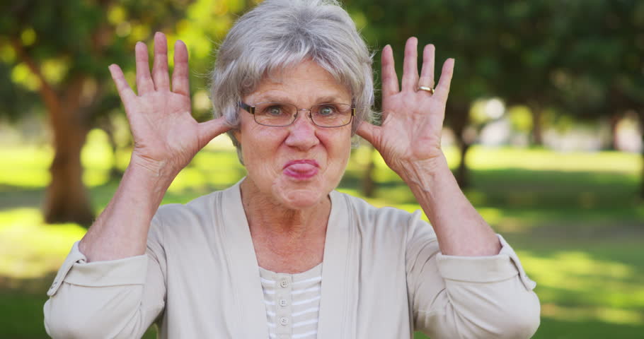 Silly Grandma Making Funny Faces At The Camera Stock Footage Video ...