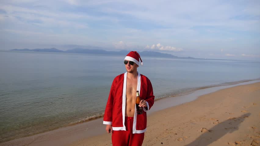 Drunk Santa Claus Drinking Beer On A Beach. Merry Christmas And Happy ...