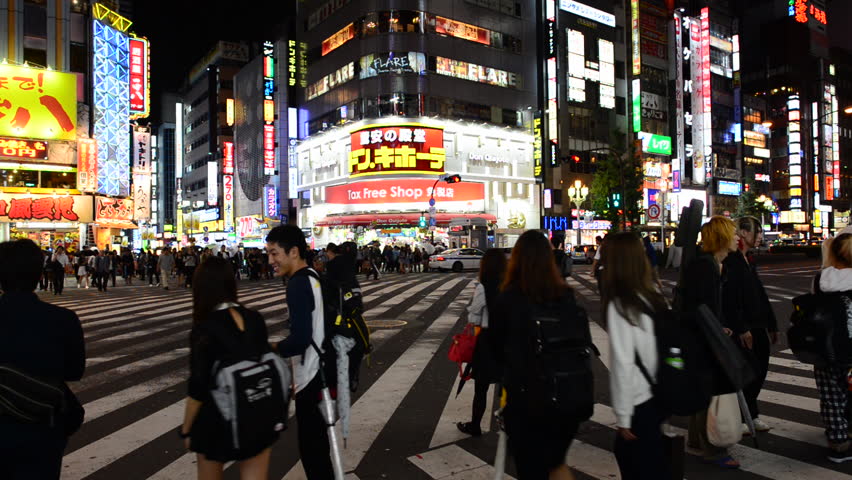 TOKYO, JAPAN - MARCH 24, 2014: Large Crowds Of Pedestrians, Commuters ...