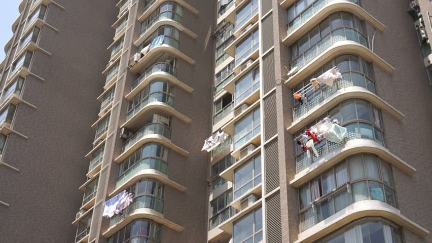Laundry Hanging To Dry Outside Stock Footage Video 100 Royalty Laundry Hanging To Dry Outside Shanghai Apartment Building Chinese Residents Hang Clothes Their Windows On Racks For Drying