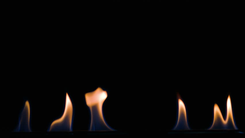 Light Moving Fire Flame Of The Fireplace On Black Background