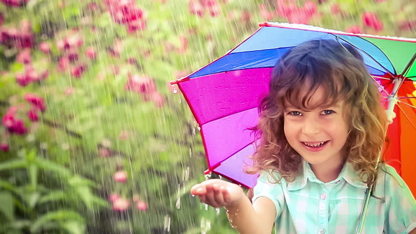 Video stock a tema happy child walking in the rain. | 8852053 ...