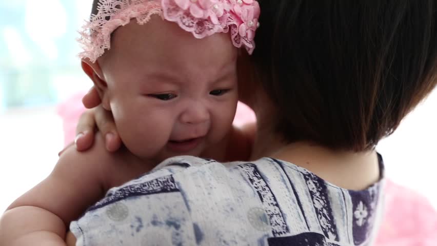 Young Mother Comforting Crying Baby Stock Footage Video 100